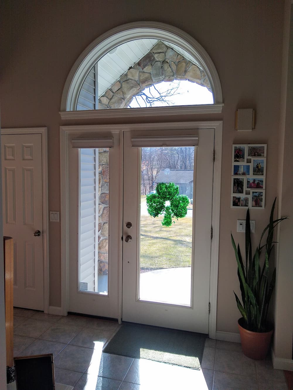 Before interior shot of Ludlow home's existing entry door