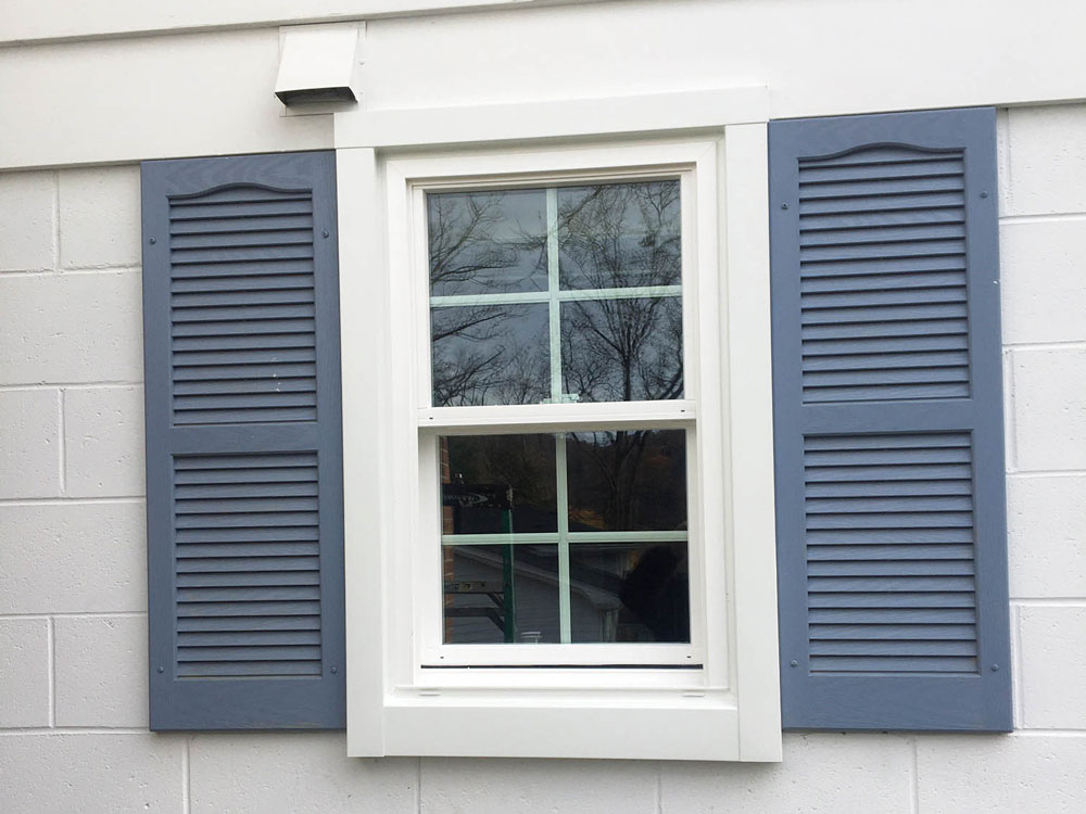 Exterior of new Pella 250 Series vinyl double-hung window on Conneaut Lake home