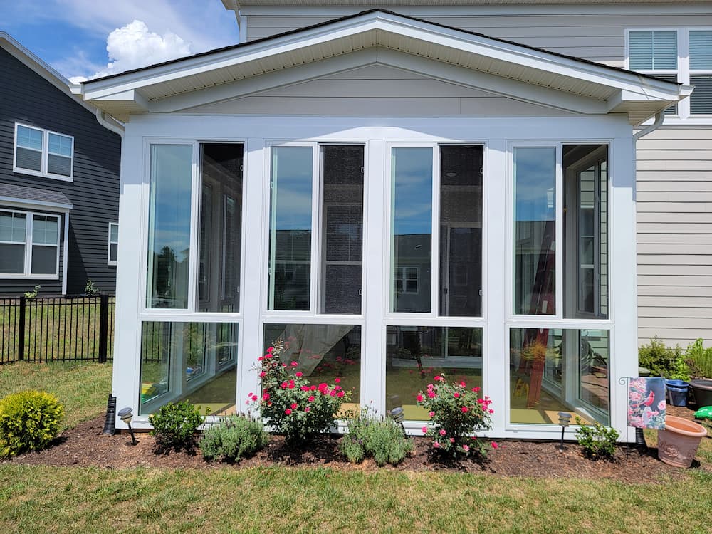 Exterior shot of four-seasons room with fiberglass windows in Crozet, VA