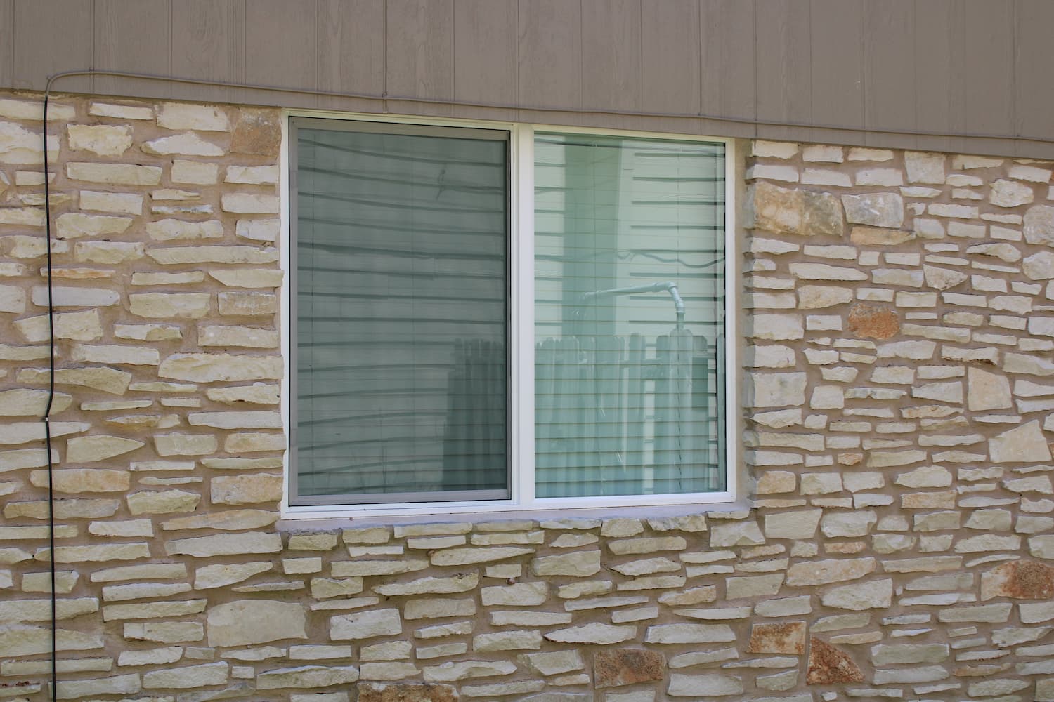 round rock home with replacement encompass series windows