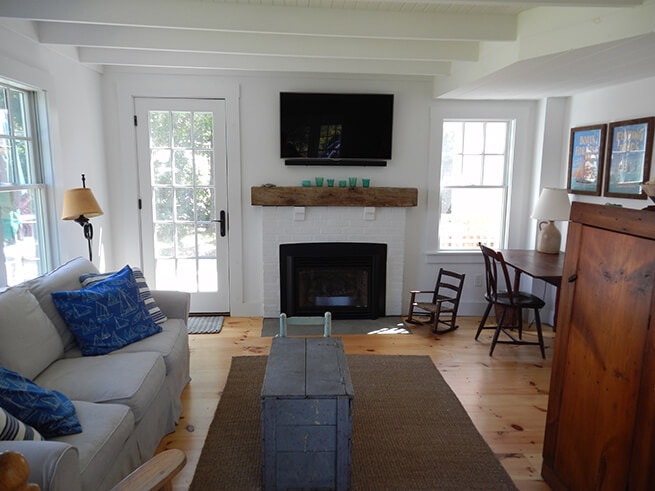 Living room in Cape Cod cottage with new wood windows