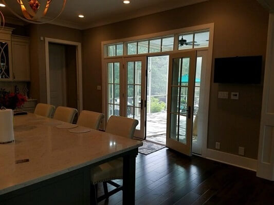Interior view of French hinged patio doors in newly constructed home in Pewee Valley