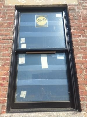 double-hung wood window replacement on historic building renovation