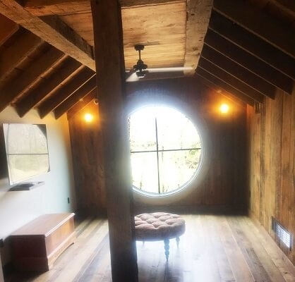 circle wood window in new construction home