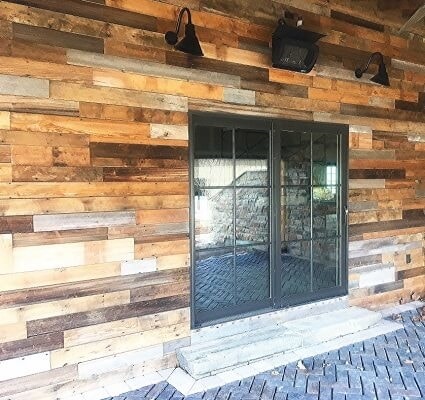 wood casement windows on wood plank wall