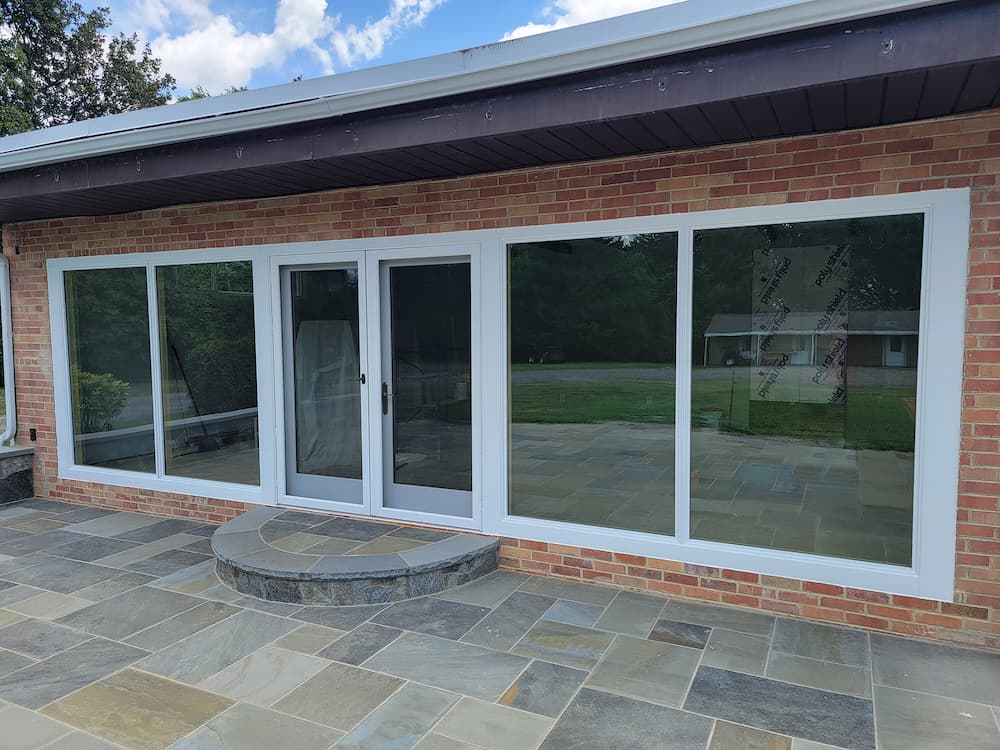 Richmond patio exterior featuring new hinged (French) doors