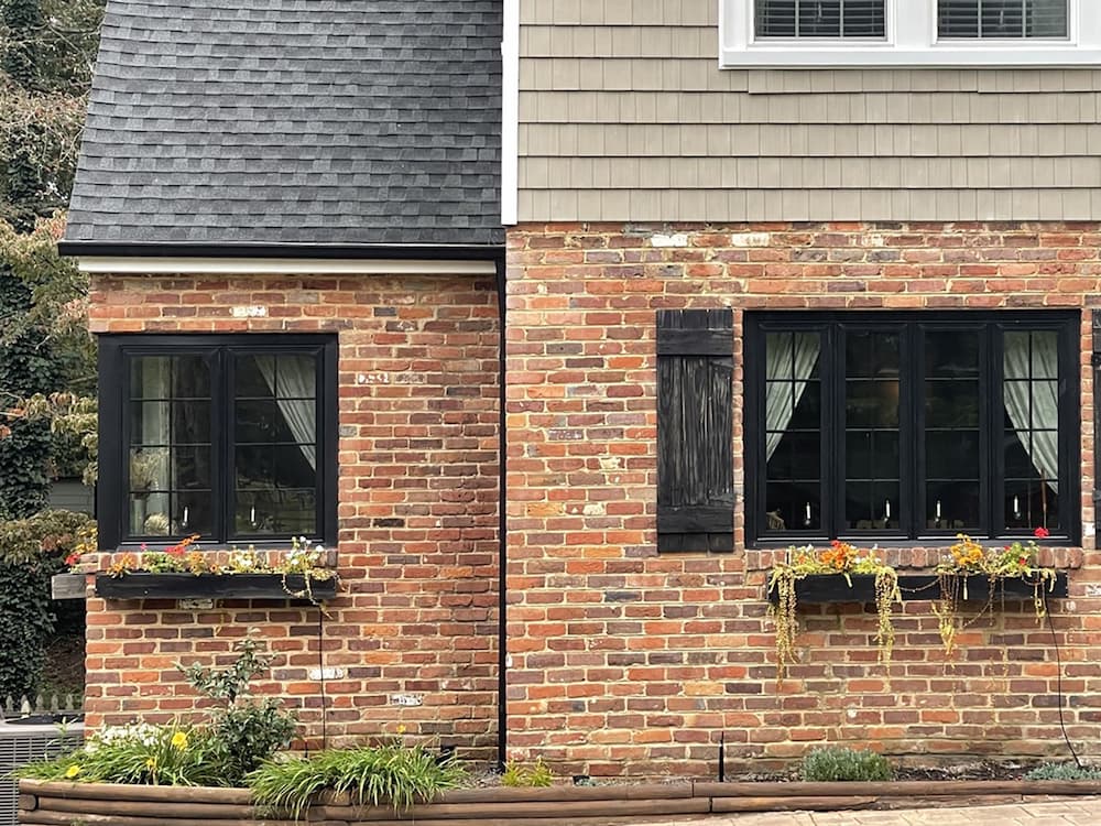 Brick exterior of Richmond home after installing new fiberglass casement windows