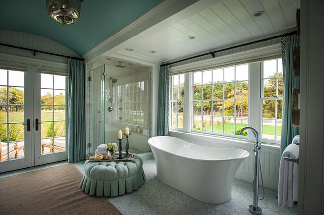 Bathroom with large windows and French patio doors in the 2015 HGTV Dream Home in Martha's Vineyard