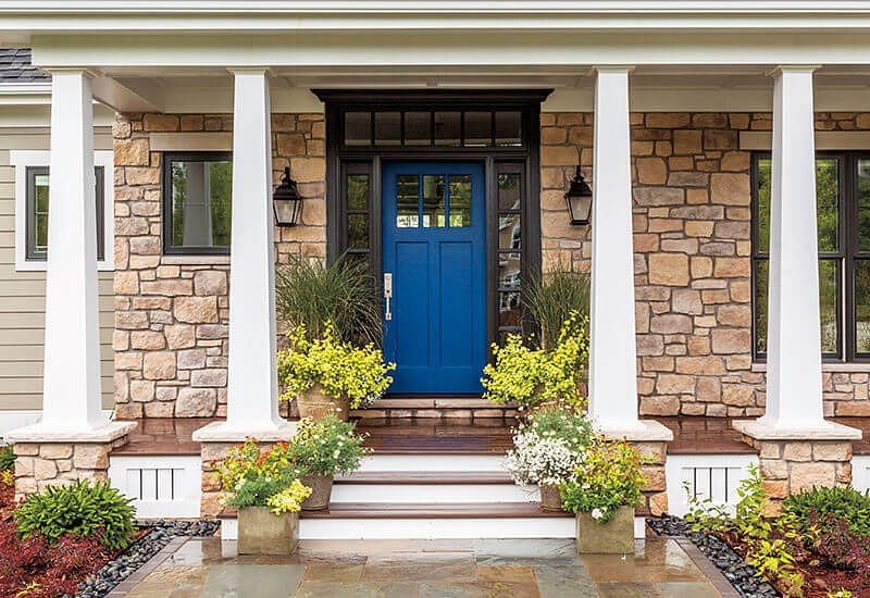 Blue front door and exterior of home