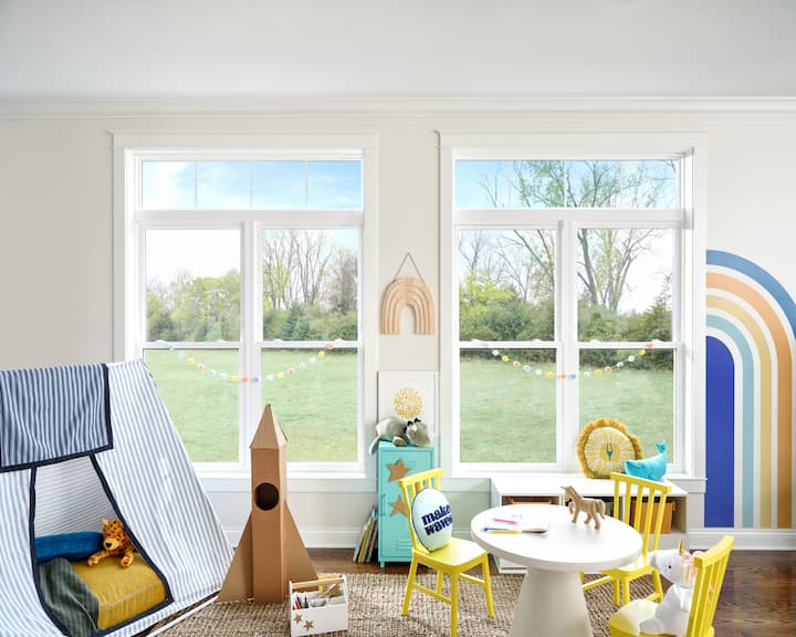 White double-hung windows in children's playroom