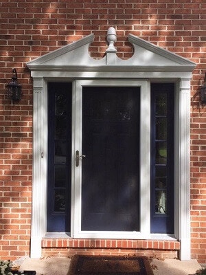 storm door image of philadelphia home with new vinyl double hung windows and doors