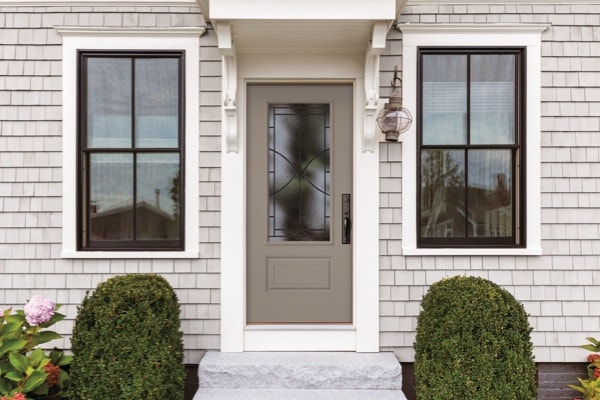 image of a clean fiberglass entry door with a large window panel