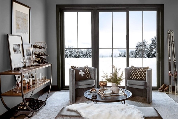 Ski lodge living room with Pella Impervia patio doors