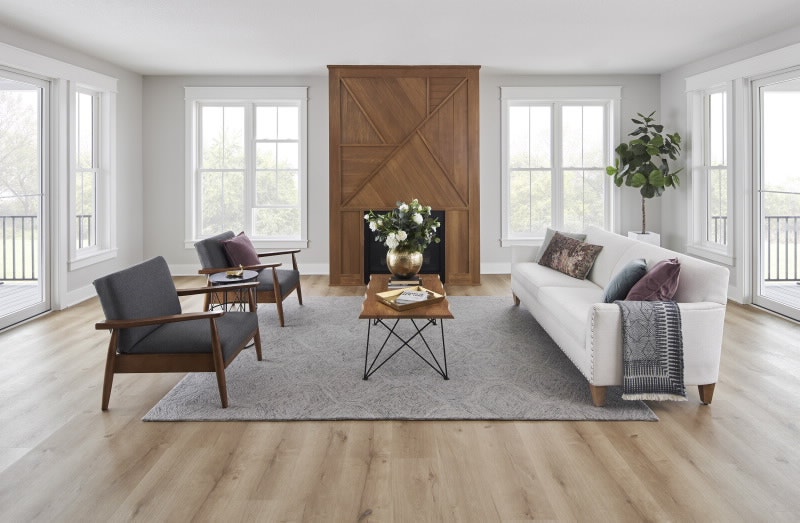 Pella windows in living room with simple furniture arrangement