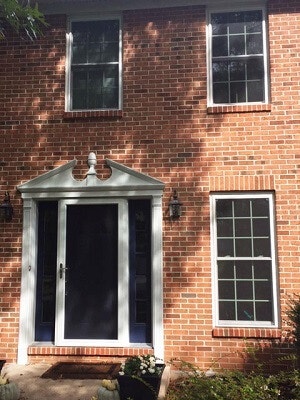 front after image of philadelphia home with new vinyl double hung windows and doors