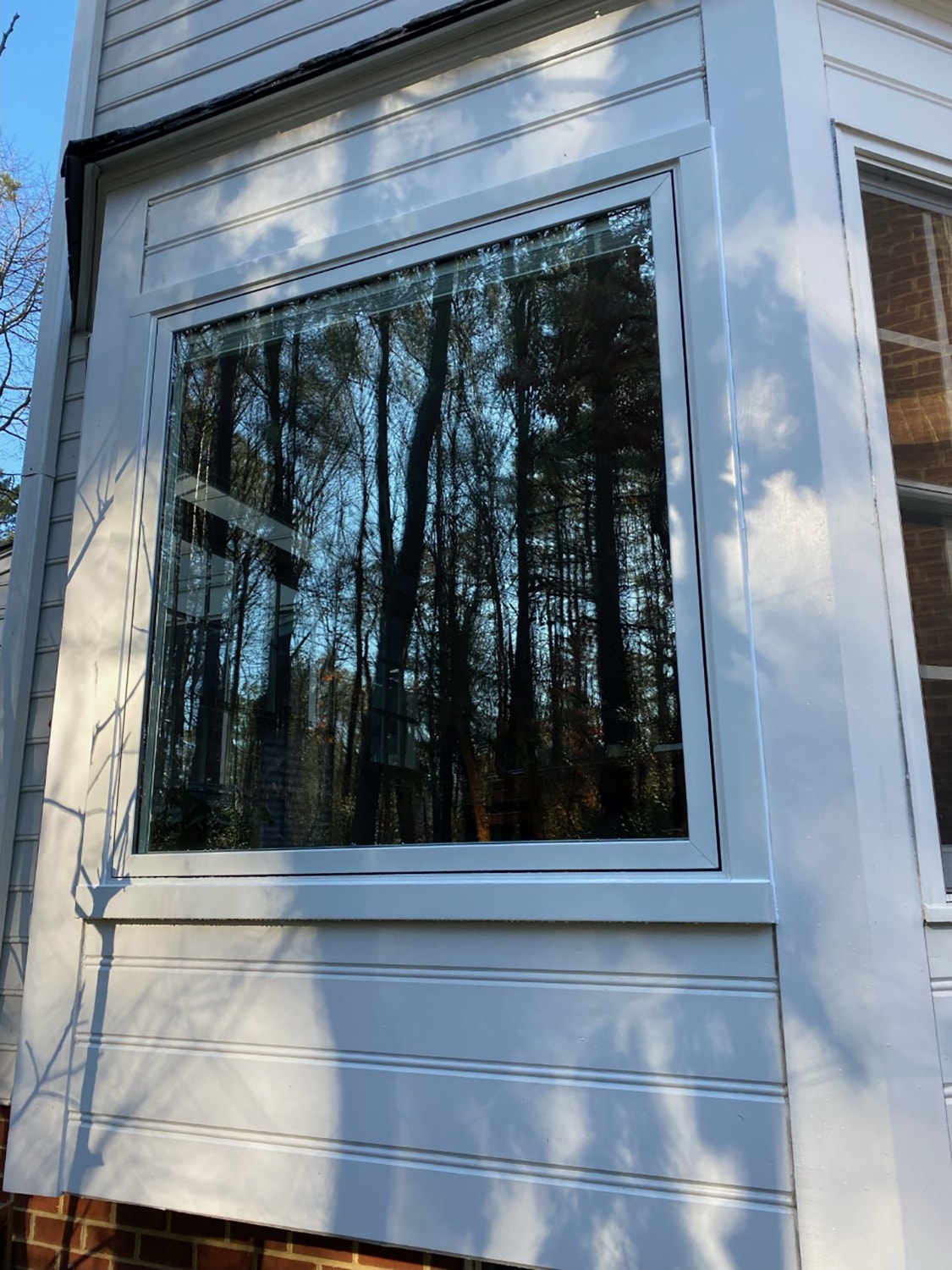 Exterior shot of fixed window on Henrico home