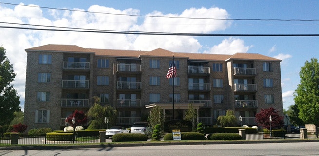 Full exterior view of Valley View Condos with new Impervia fiberglass windows