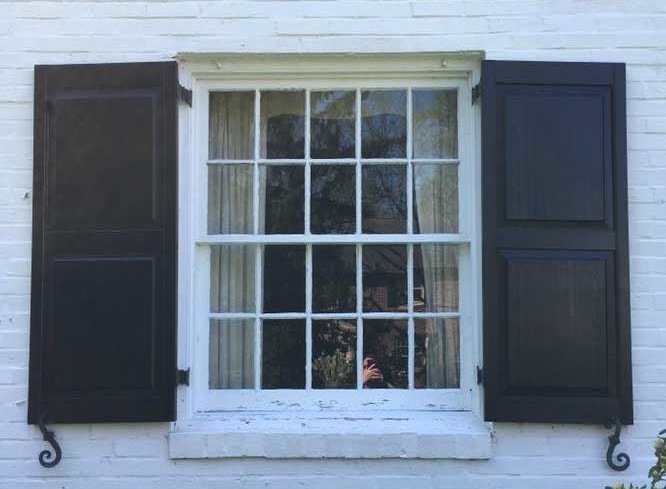 old wood window with peeling paint