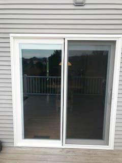 Exterior view of new sliding glass patio door