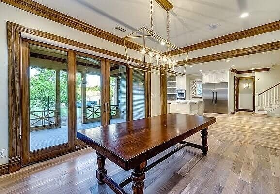 Interior home dining room with patio doors