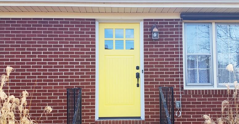front image of virginia home with new entry door