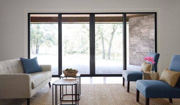 Black contemporary sliding glass doors in a living room