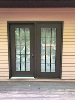 Old brown hinged patio door