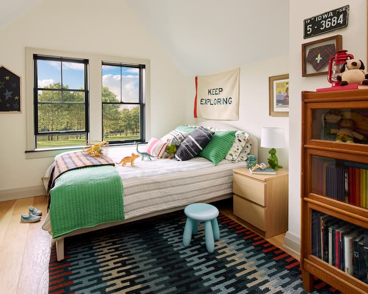 Boy bedroom with black double-hung windows