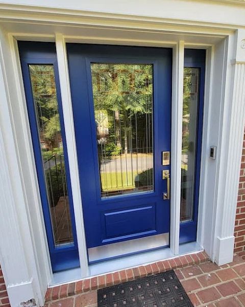 Exterior view of new jewel-tone blue front door from Pella on Charlottesville home