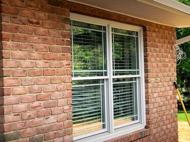 Wood double-hung windows with prairie-style grille pattern
