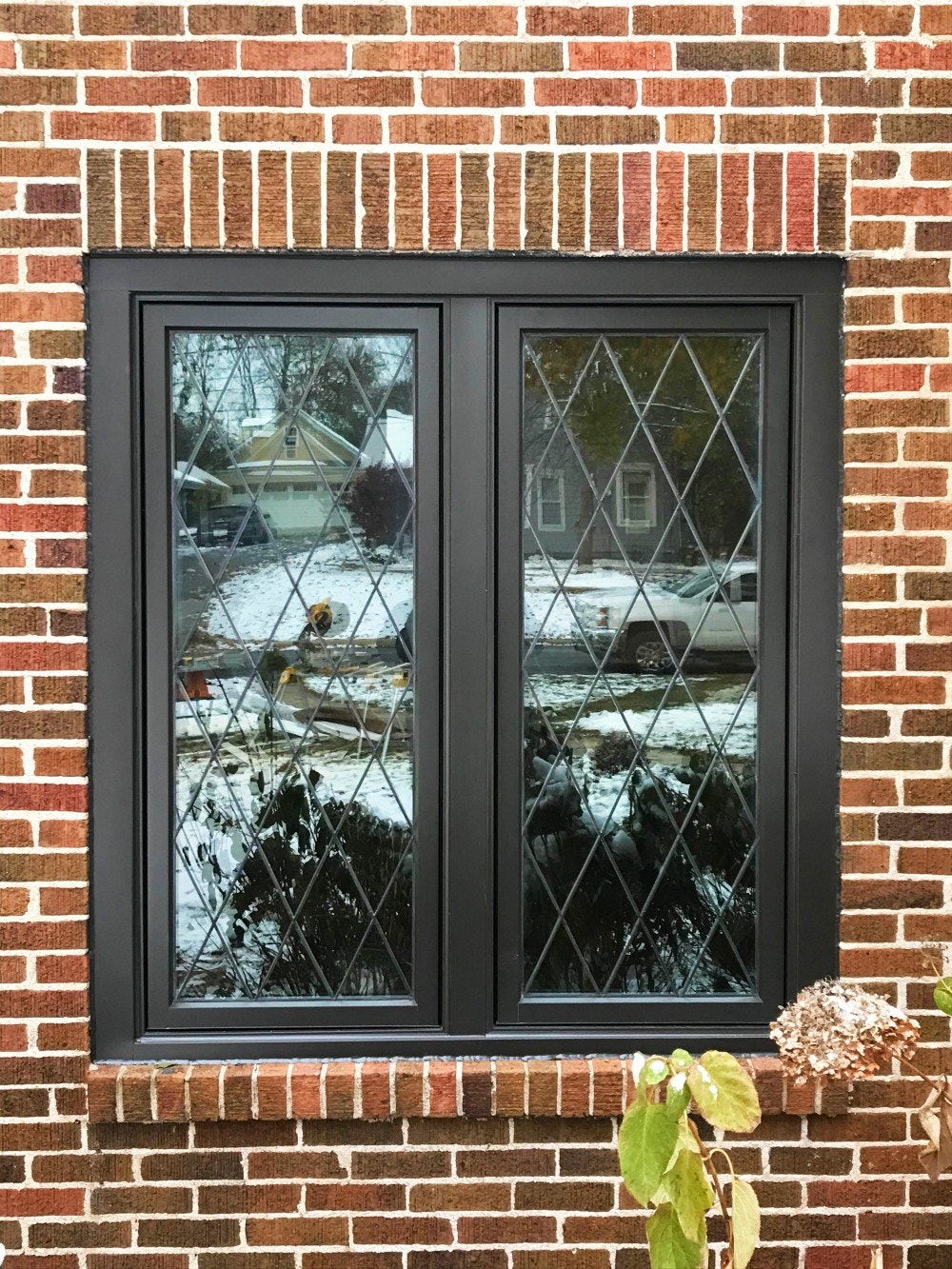 black casement window diamond exterior