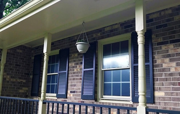 double-hung window replacement on front porch