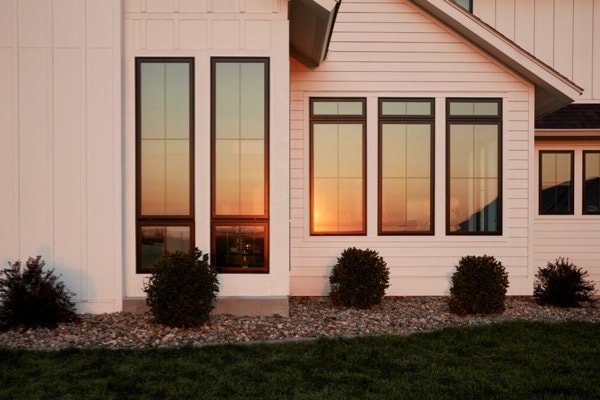tall windows with thin grilles on a farmhouse style home