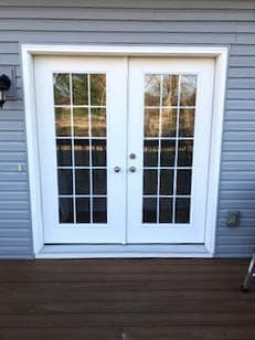 White French patio doors with traditional grille pattern