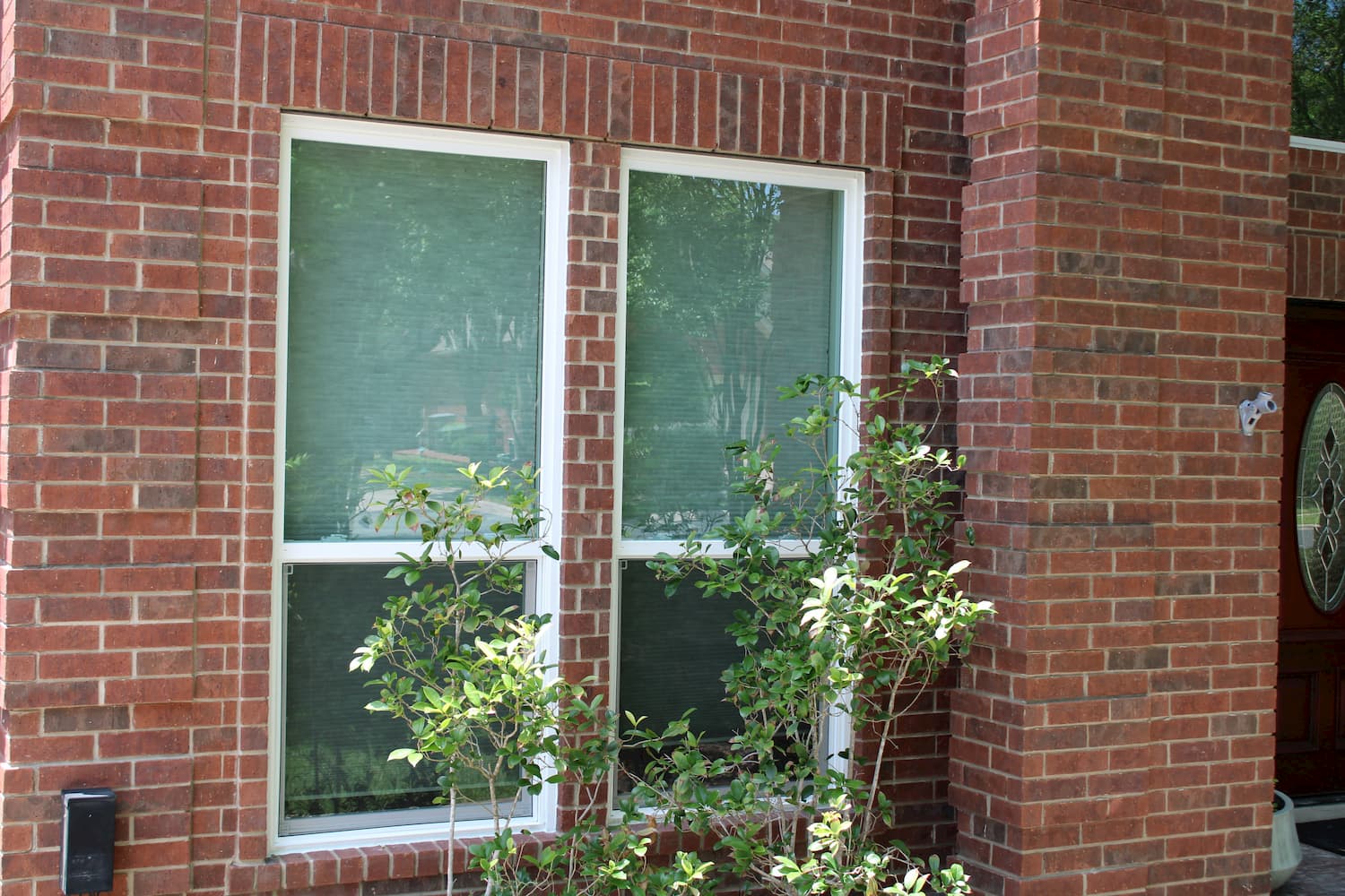 first floor brick cedar park home replacement pella 250 series windows