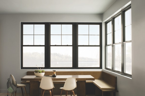 Craftsman-style windows surround a corner breakfast nook