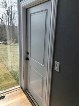 White side entry door before replacement