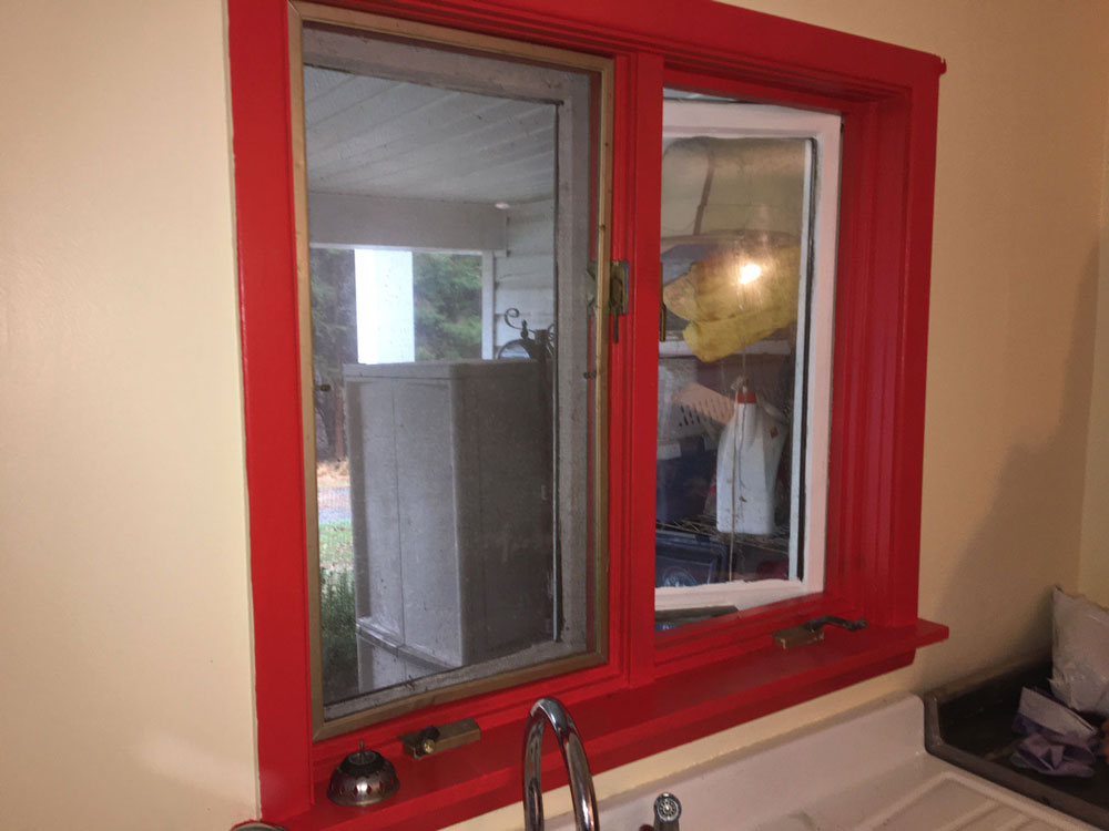 Red window in Erie, PA, home before whole-home window replacement