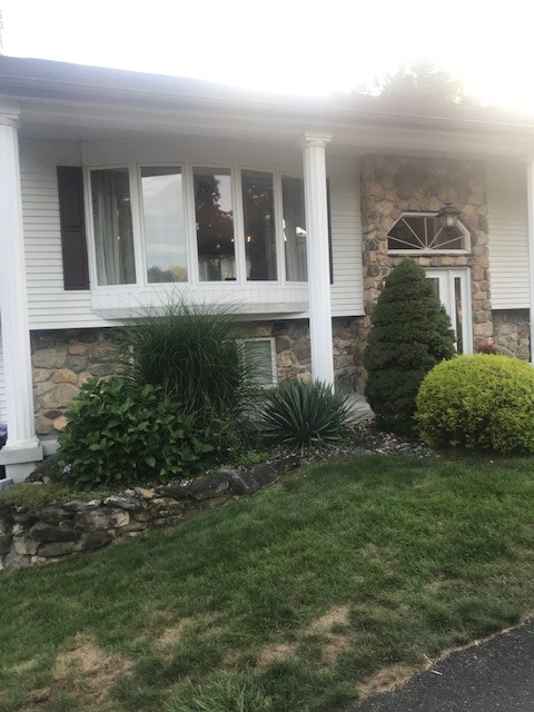 Somers, CT, home with bow window before window replacement project