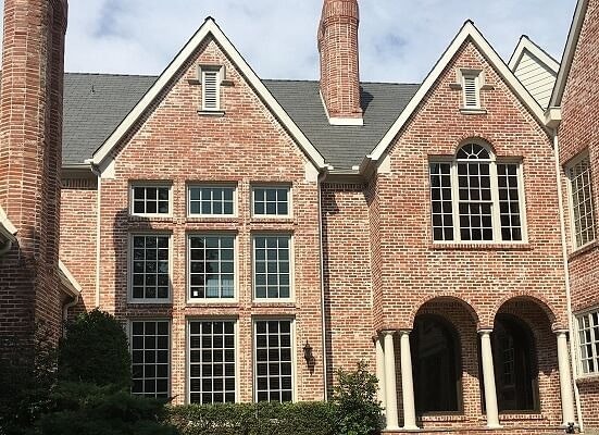 Brick home with a lot of windows