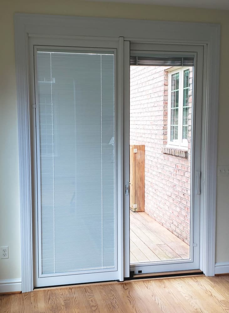 Wood sliding patio door with between-the-glass blinds