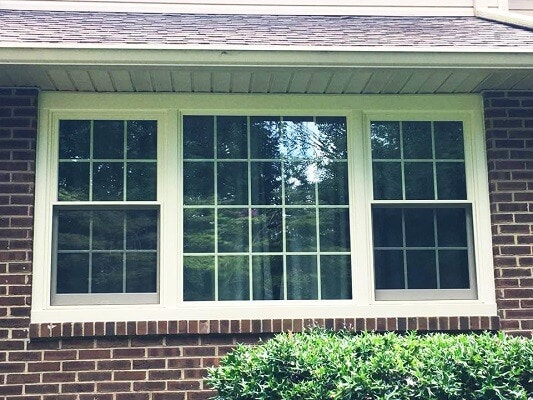 front of home in philadelphia gets new wood casement windows 