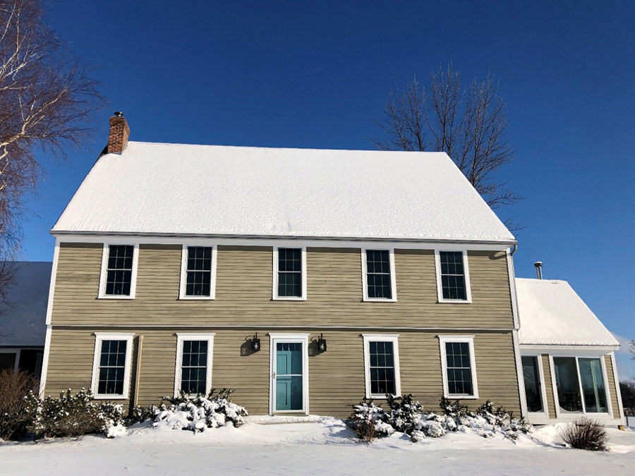Center Hall Colonial home in Charlotte, VT, after window replacement