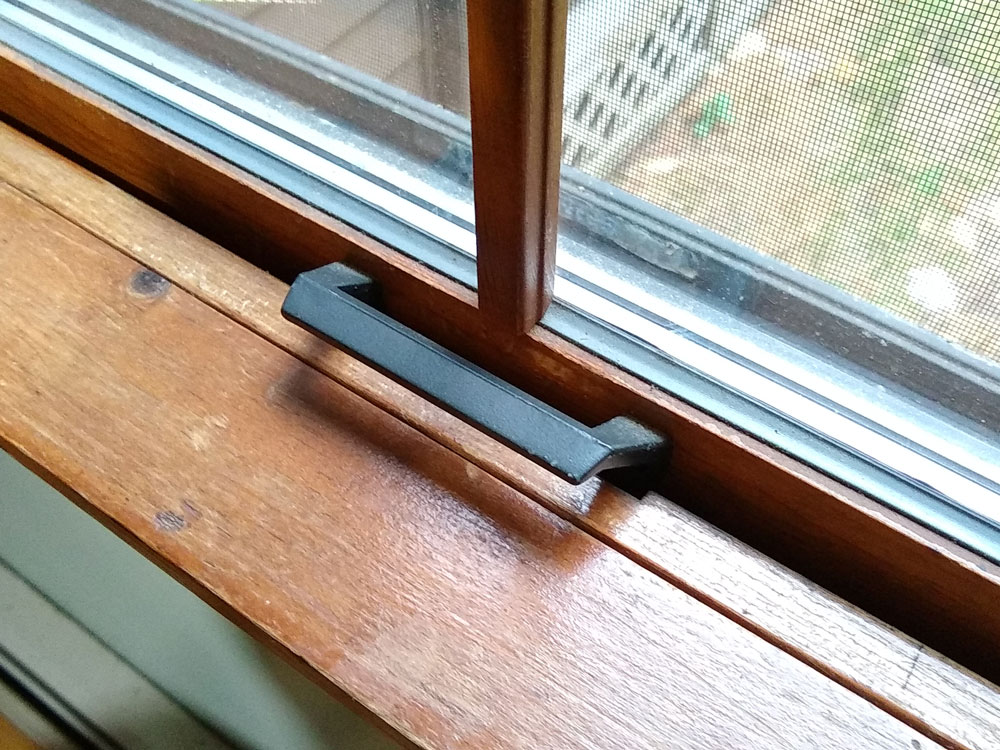 Custom work on the window sills to correct notches from handles