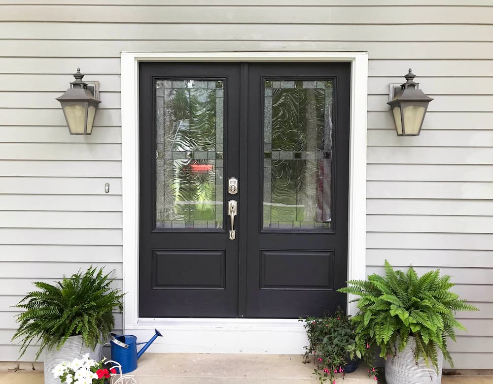 New black fiberglass double entry doors with decorative glass