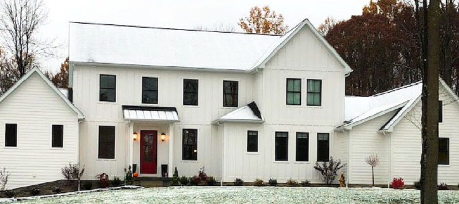 wintery home with black windows