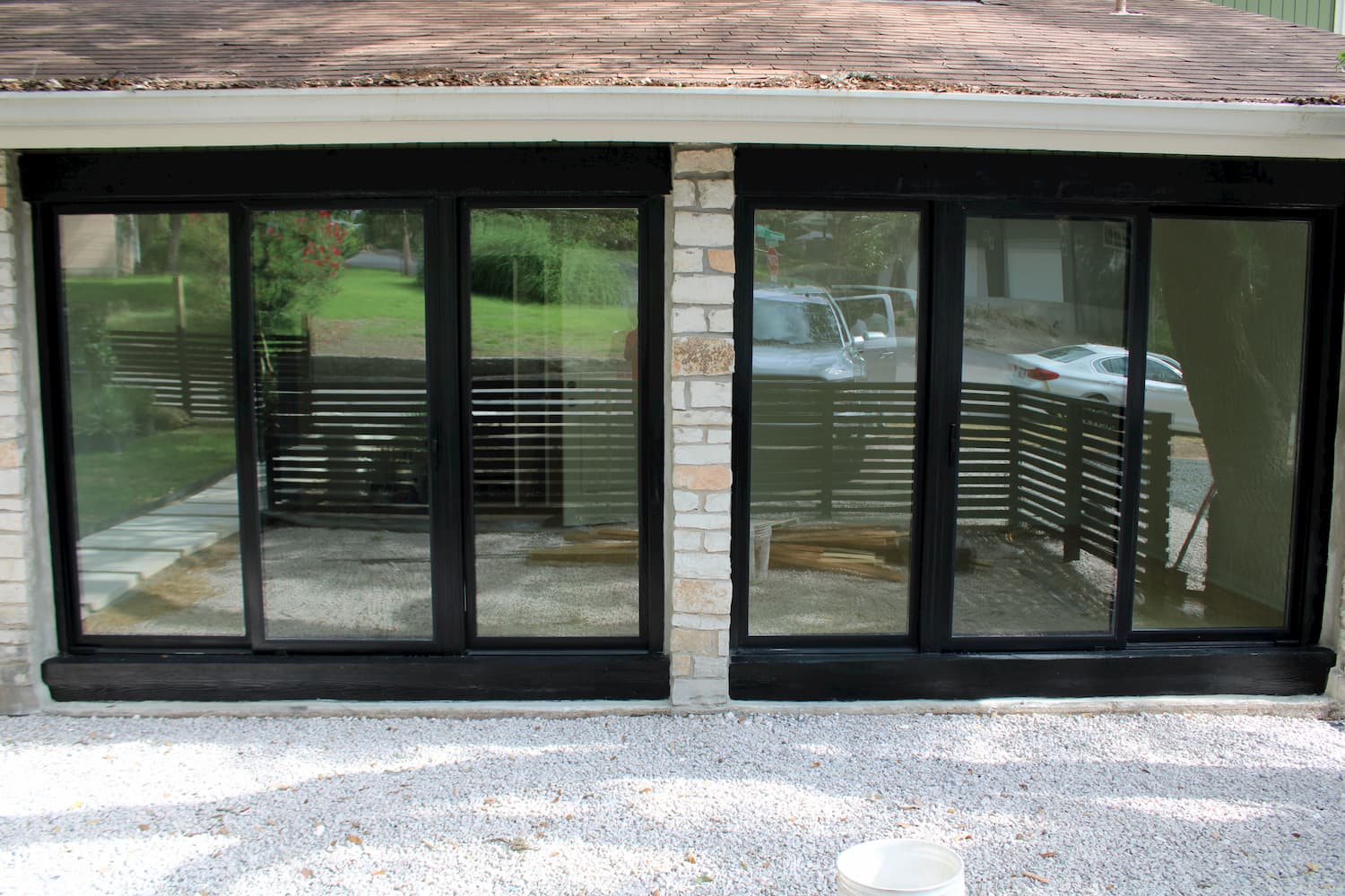 Triple sliding doors installed on garage converted to a music studio