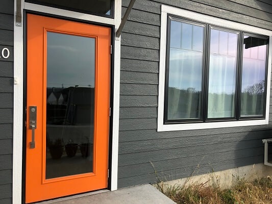 door image of cohousing apartment in iowa city with fiberglass casement windows