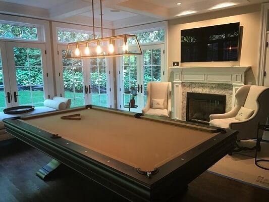 game room view of fairfield home with new hinged patio doors