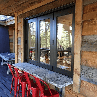 northern california home with custom mini bifold patio doors used as pass through window
